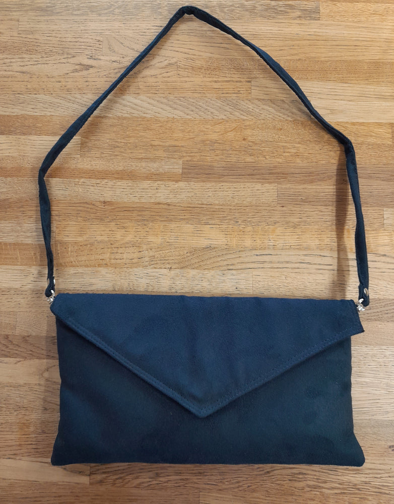 
                  
                    IAS Faux Suede Clutch Bag With Attachable Strap
                  
                