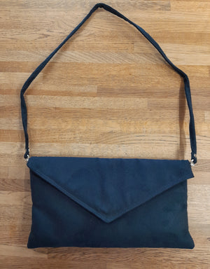 
                  
                    IAS Faux Suede Clutch Bag With Attachable Strap
                  
                
